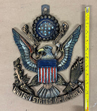 Load image into Gallery viewer, Cast iron American Eagle USA sign with a flag design featuring military themes in red, white, and blue.
